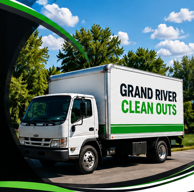 GrandRiver Cleanouts box truck parked on a residential street